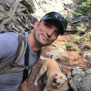 Hanging out with Daisy the Wonder Dog after bouldering up an avelanche chute